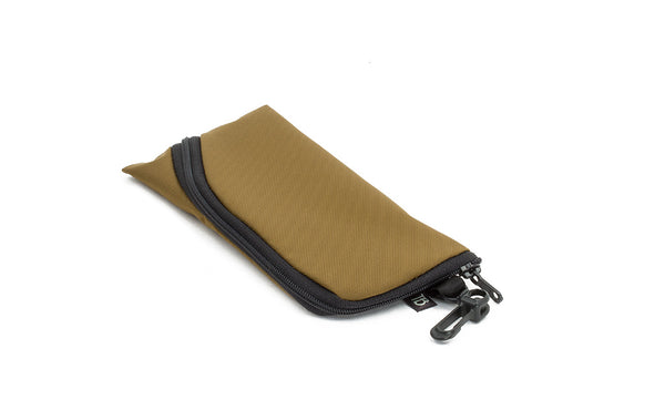 A Small Ghost Whale Pouch in  Coyote (golden tan).